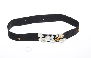 Detail of western cowboy hat band featuring elegant white pearls and gold floral beads