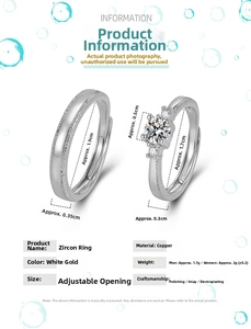 Detail showing adjustable silver-colored couple rings with zircon inlays and measurements