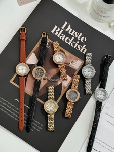 Collection of luxury quartz watches with rhinestone bezels and mother-of-pearl dials