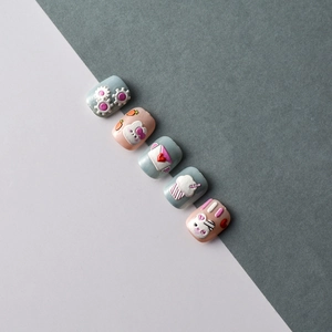 5-piece 3D embossed cute rabbit and cupcake nail art stickers with self-adhesive design