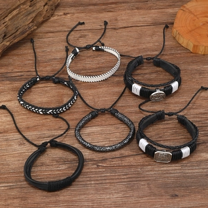 Punk style set of 6 men's black braided leather bracelets with skull and star charms