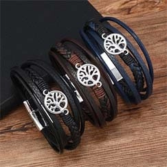 Detailed set of multi-layer woven leather bracelets with Tree of Life metal charms