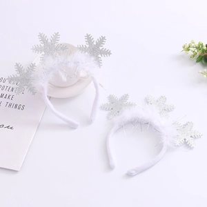 Pair of plush white headbands with silver glitter snowflakes for Christmas party costume