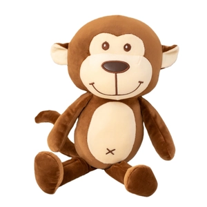 Cute brown monkey plush toy with long tail sitting on white background for kids