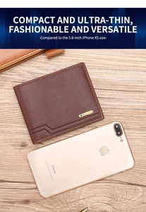 Slim brown leather men's wallet with lychee grain texture and metal logo on a wood table