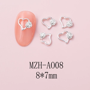 Detail view of 8x7mm silver alloy heart and rose nail art charms for luxury decoration