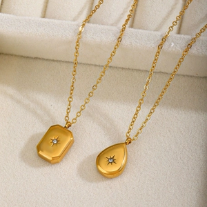 Gold stainless steel starburst necklaces with zircon stones in rectangle and teardrop shapes