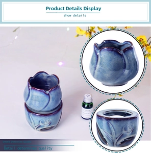 Detailed macro view of the tulip-shaped ceramic oil burner with hollow floral carvings