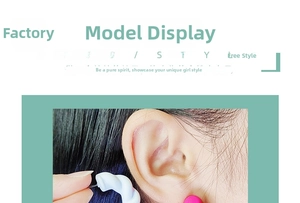 Detailed view of woman wearing twisted C-shape acrylic earrings and round matte studs
