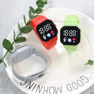 Close-up of three LED digital sports watches with astronaut icons and silicone straps