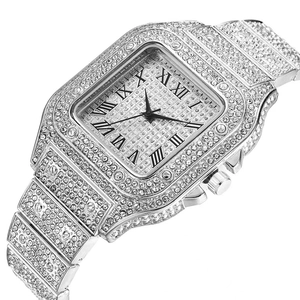 Macro view of a square silver quartz watch featuring Roman numerals and full crystal inlay