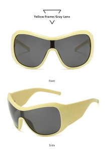 Detail view of oversized Y2K sunglasses with beige frame and textured quilted temples