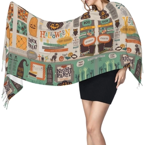Detail shot of Halloween scarf featuring pumpkins, ghosts, and festive bat patterns