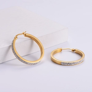 Classic gold hoop earrings for women featuring side-set sparkling zircon crystals