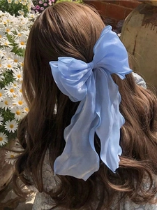 Elegant light blue chiffon ribbon bow hair clip for women with long flowing streamers