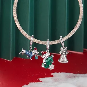 Christmas 925 sterling silver charm bracelet with gingerbread dog, bear, and snowflake bell
