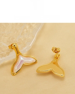 Detail of 18K gold plated fish tail earrings with iridescent resin inlay texture