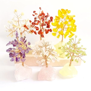 Detailed collection of crystal money trees with wire branches and natural quartz base