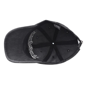 Internal view of washed cotton baseball cap with sweatband and 100% cotton label detail