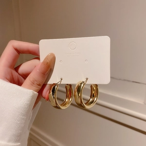 Irregular chunky golden hoop earrings with 925 silver posts in minimalist retro style