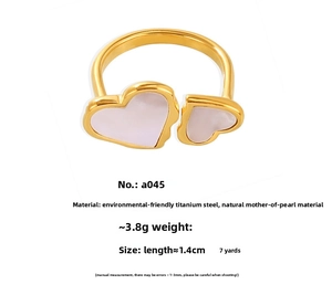 Detail view of asymmetric gold heart ring with natural mother of pearl inlay specifications