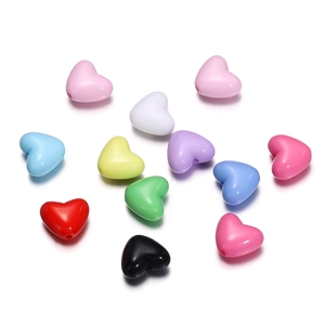 Scattered colorful acrylic heart beads for DIY jewelry making and phone charms