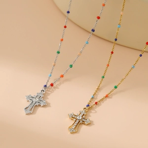 Cross pendant necklace with mixed color beads and rhinestones in gold and silver