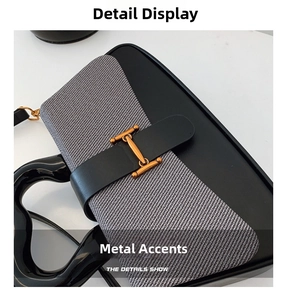 Macro shot of gold-tone hardware and contrast leather stitching on chic handbag