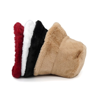 Plush faux fur bucket hats in red, white, black, and khaki showing soft texture