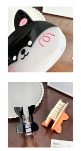 Detail view of cute cat-shaped hair claw clips showing polished finish and sturdy spring