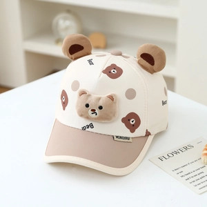 Detailed view of beige cartoon bear baseball cap with plush ears and 3D embroidery