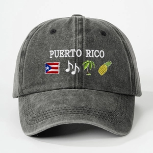 Detailed embroidery of Puerto Rico text and island icons on washed denim baseball cap