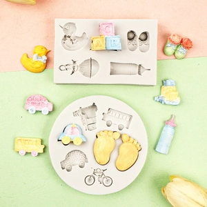 Baby shower themed silicone mold set with car, bottle, and alphabet blocks for cake baking