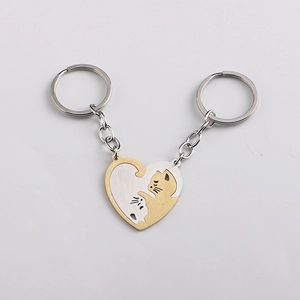 Polished stainless steel cat heart keychain for couples in gold and silver finish