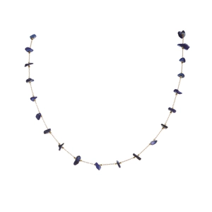 Detail of thin gold chain necklace with deep blue natural stones and irregular beads