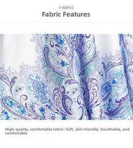Close-up of soft breathable white paisley print fabric with blue and purple patterns