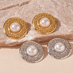 Vintage textured metal stud earrings with large pearls in gold and silver finish