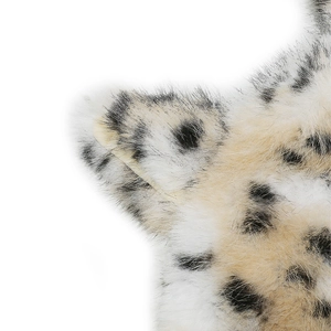 Detailed macro view of plush leopard print faux fur texture on women winter hat