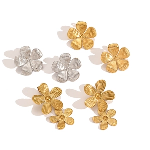 3D floral stainless steel earrings set in gold and silver finish with brushed texture
