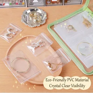 Portable anti-oxidation jewelry storage organizer with clear PVC bags and green binder