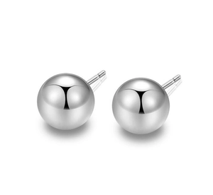 Macro shot of polished S925 sterling silver ball studs with high mirror finish