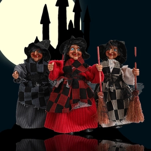 Three Halloween hanging witches with brooms on a castle moon backdrop