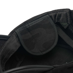 Detailed macro view of black breathable mesh padding and durable fabric helmet straps