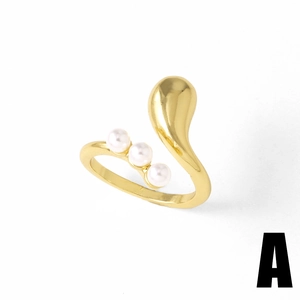 Gold-plated adjustable open ring with three pearl accents and irregular crossover design