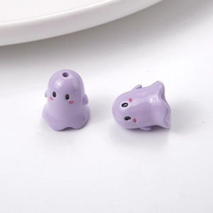Detail view of purple cartoon ghost acrylic charms for DIY crafts and phone chains