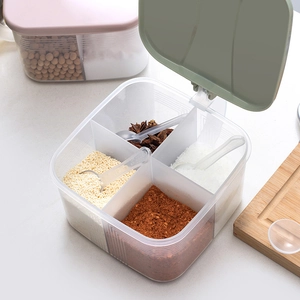 Kitchen four-compartment plastic seasoning box with green lid and transparent spoons