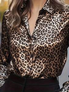 Detail of classic lapel and silky satin texture on this leopard print long sleeve shirt