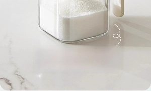 Close-up of a 400ml high borosilicate glass seasoning jar on a marble surface