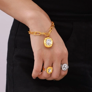 Minimalist gold and silver titanium steel jewelry set with crystal textured oval plates