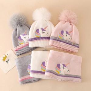 Close-up of children's unicorn embroidery knit hat and scarf set in three colors